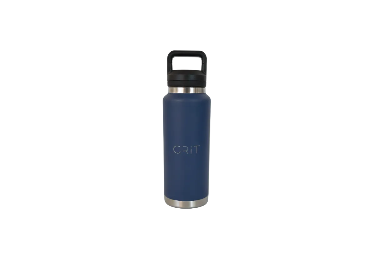 Blue water bottle with 'GRIT' branding on a light gray background