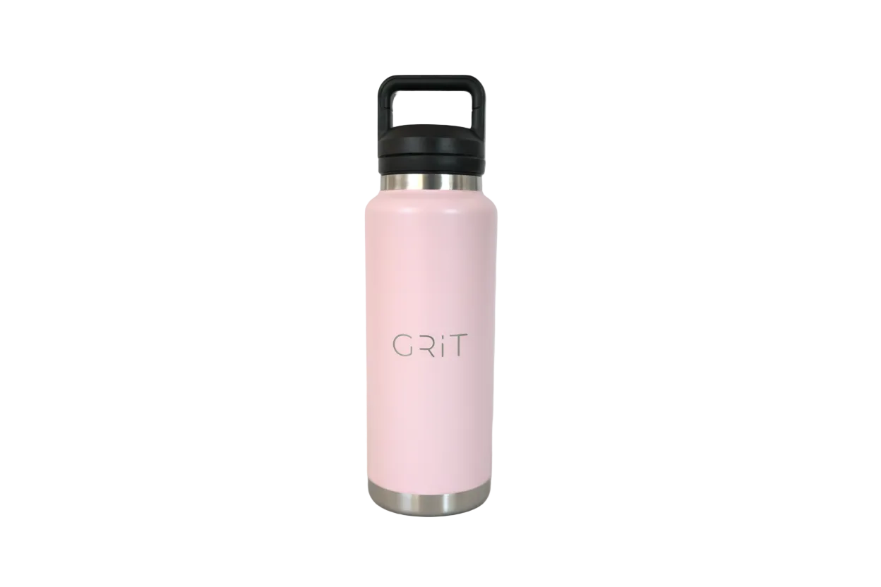 Pink water bottle with black lid on a gray background