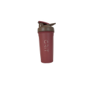 Maroon shaker bottle with brown lid on a white surface