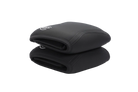 Pair of black knee pads with a logo on a beige surface